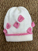 Cappello con fiocchi pura lana