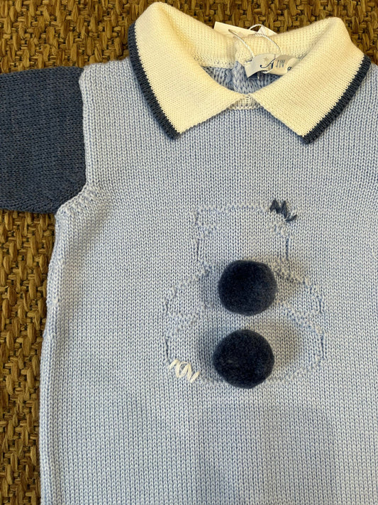 Tutina con pom pom in pelliccia
