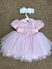 Abito in tulle con cinta di fiori e fascia fiori abbinata