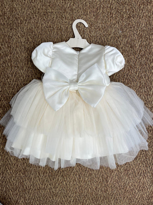 Abito elegante in tulle con fiocco in raso